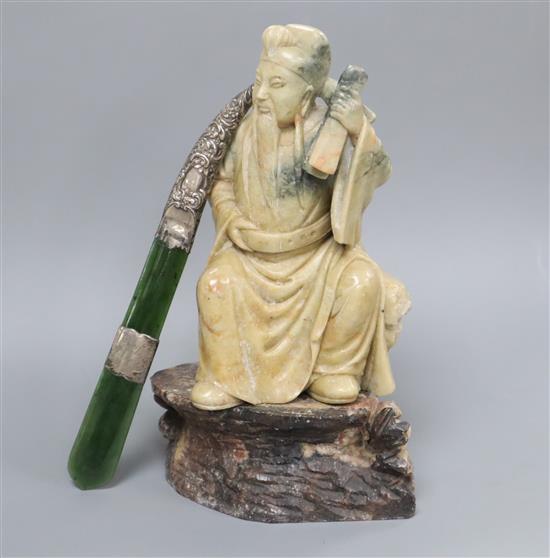 A 19th century hardstone carved sage on stand and a jade letter opener